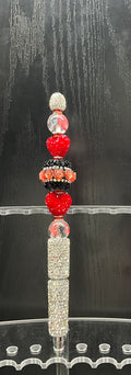 Red beaded pen