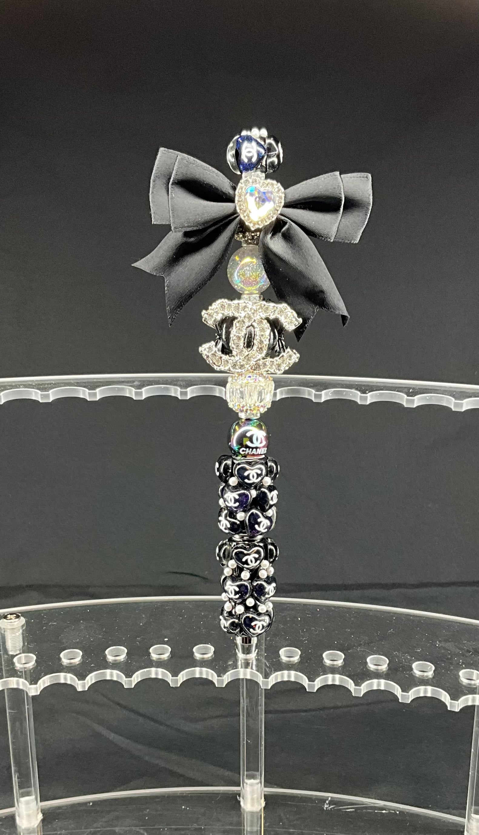 Black LV pen with bow
